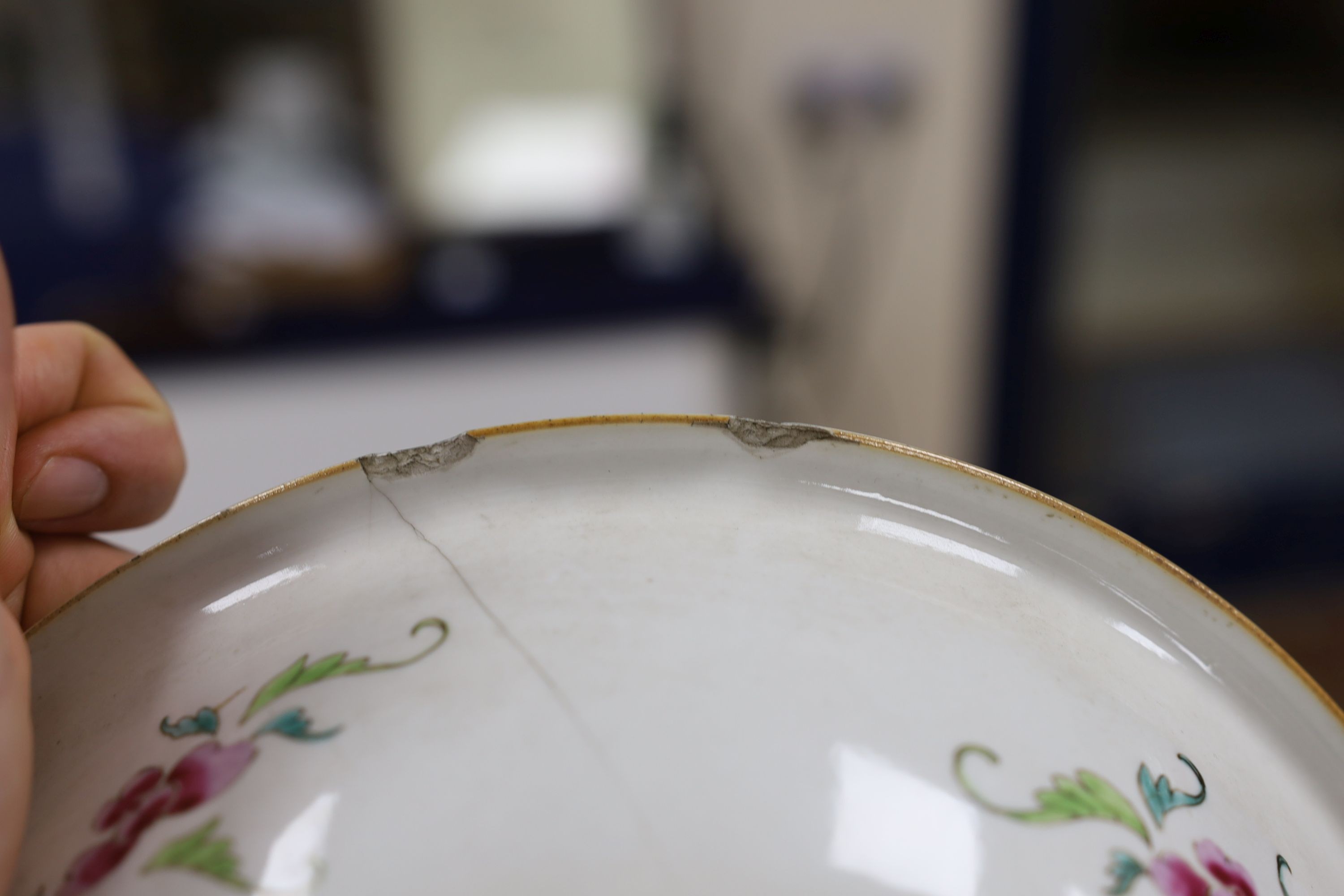 A Chinese underglaze blue and famille rose decorated basin or bowl, Qianlong period, 27 cm diameter